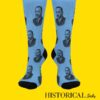 Front-facing view of MLK portrait socks in blue worn by standing model