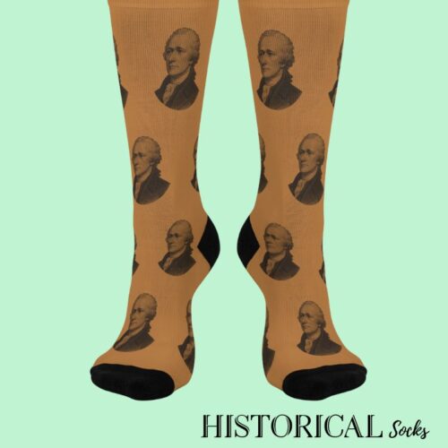 Front-facing view of legs wearing brown Alexander Hamilton socks with black heels and toes