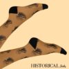 George Washington socks in brown, shown on legs raised with visible portrait pattern