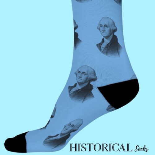 Blue George Washington socks featuring engraved-style portrait, side view on legs with black heel and toe