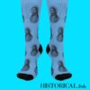 Blue Jesus socks front view with repeated black portraits of Christ