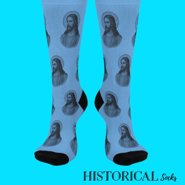 Blue Jesus socks front view with repeated black portraits of Christ