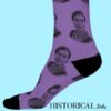 Side view of Rosa Parks Socks in purple with black heel and toe, worn mid-step to showcase portrait design.