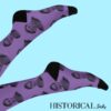 Legs raised wearing Rosa Parks Socks in purple on a soft blue background, showing the full design and stretch.