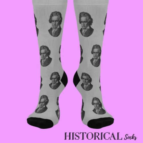 Front view of gray Beethoven socks with repeated classical portrait design and black toe and heel