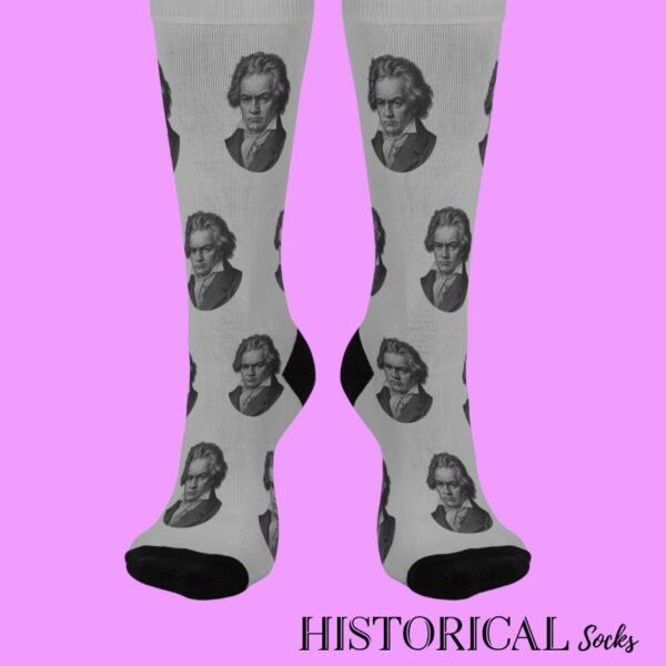 Front view of gray Beethoven socks with repeated classical portrait design and black toe and heel