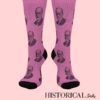 Front view of pink Freud socks with engraved portrait pattern and black heel and toe