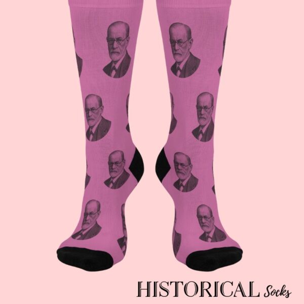 Front view of pink Freud socks with engraved portrait pattern and black heel and toe