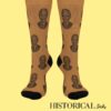 Front-facing view of brown socks featuring Nelson Mandela portrait pattern with black accents