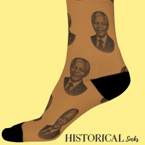 Brown Nelson Mandela socks with repeating engraved-style portraits and black heel and toe